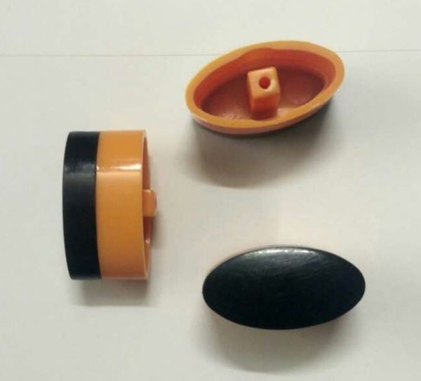 Изображение Кнопка овальная для плиты Gefest В-12-02-09-00 GF-141 черно-оранжевая GF-141, внешний вид и детали продукта